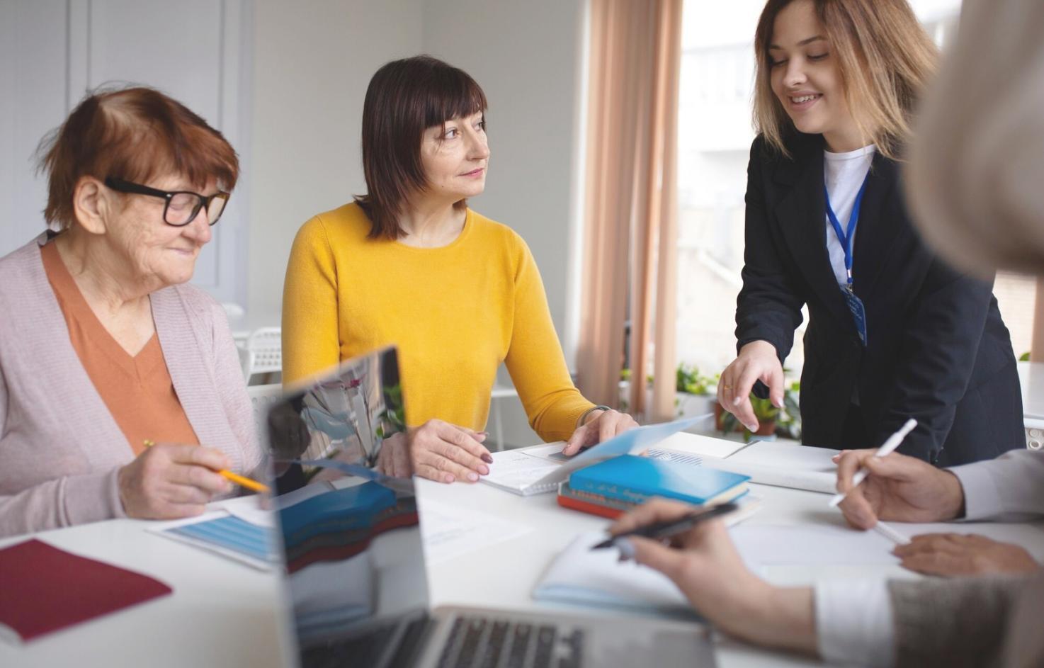 Collaborative workspace with financial charts and analysis documents